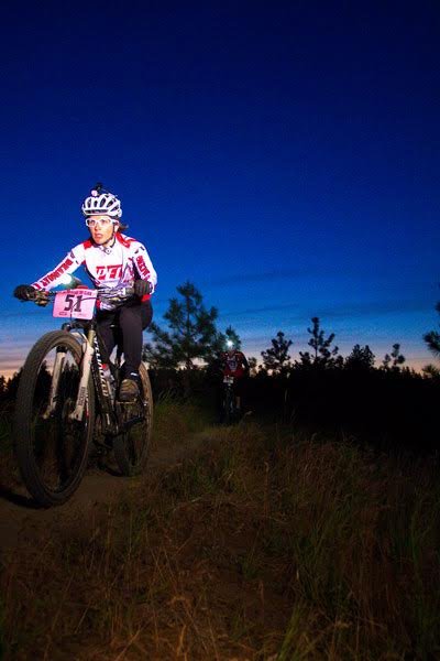 Man biking in the dark at Riverside State Park.