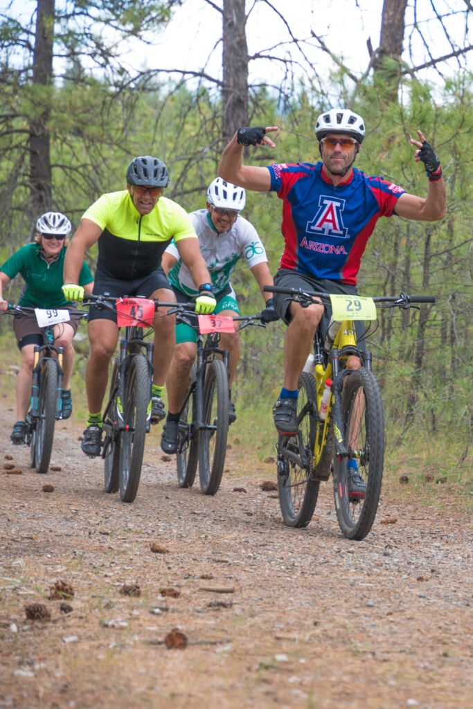 Mountain bikers riding the dirt trails at Riverside State Park during the 24-hour MTB team relay event.