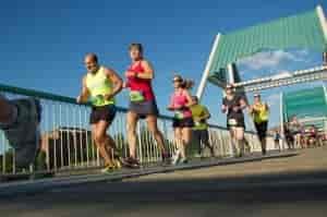 Runners crossing the Don Kardong Bridge one mile after starting the Negative Split Half Marathon. Photo: Hank Greer