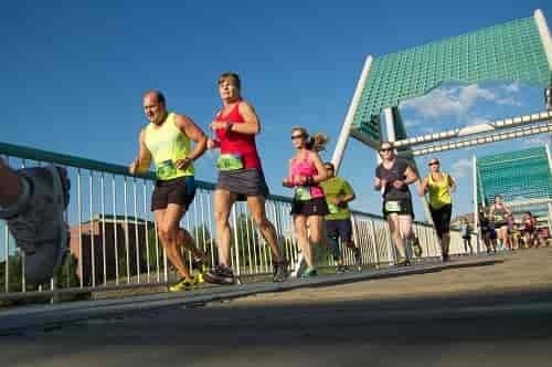 Runners crossing the Don Kardong Bridge one mile after starting the Negative Split Half Marathon. Photo: Hank Greer