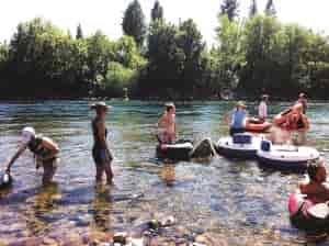 Swimmers cool off in the Spokane River below Sandifur Bridge. Photo: Shallan Knowles