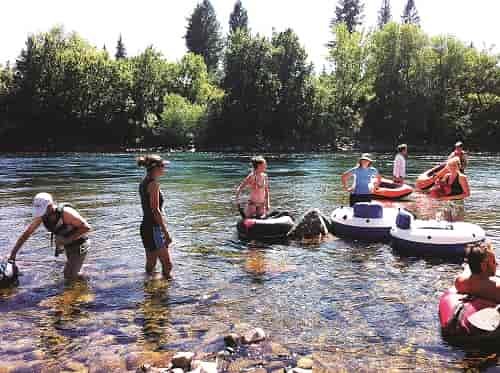 Swimmers cool off in the Spokane River below Sandifur Bridge. Photo: Shallan Knowles
