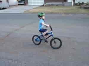 Child riding a bike.