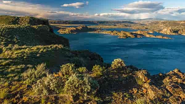 Aerial view of the Steamboat Rock State Park in Central Washington, with sagebrush and desert landscape.