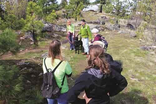 Group of hikers along a trail at Dishman Hills Natural Area in Spokane Valley, Wash.
