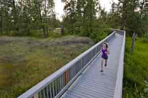 Photo of jogger running across bridge in Turnbull.