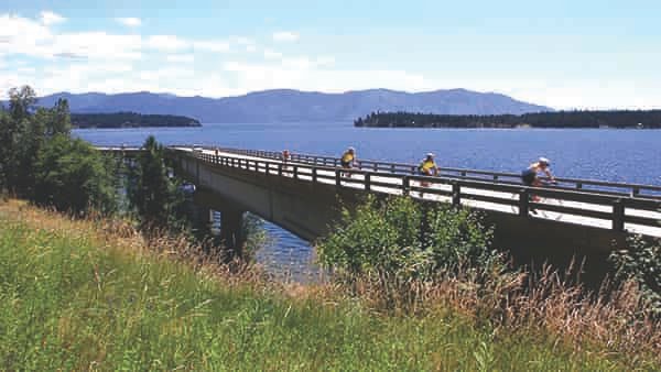 Cyclists racing on Long Bridge across Lake Pend Oreille in the Chafe 150 event.