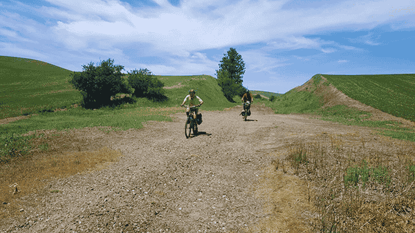 Photo of two bikers on John Wayne Pioneer Trail by Robert Yates