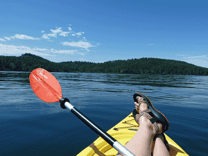 Photo of paddler on Lake CdA by Amy S. McCaffree.