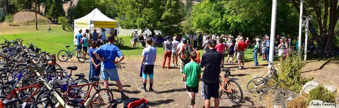 A group of bicyclists gather. 