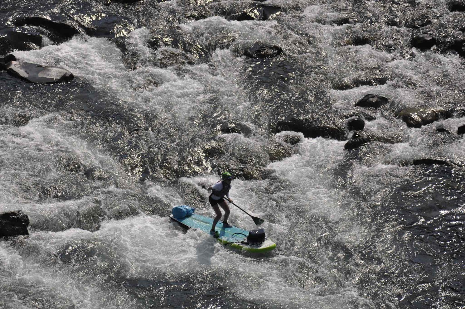 Allie paddles through the Bowl and Pitcher rapids at Riverside State Park in Spokane. (Photo from Allie Roskelley.)