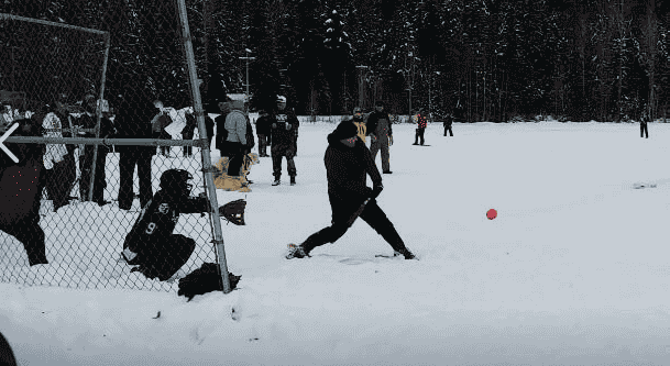 Photo of snowshoe softball tournament courtesy of Dan Barrington.
