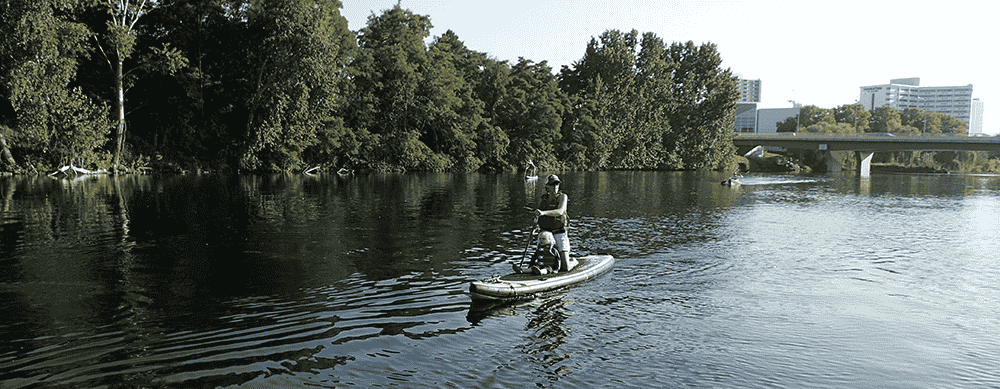 Photo of family paddleboarding on the Spokane River.