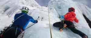 Photo of two ice climbers.
