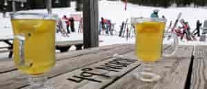 Photo of two Hot Toddies on a picnic table at 49 Degrees North.