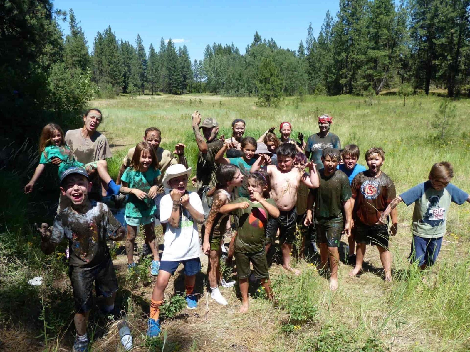 A group of muddy kids.