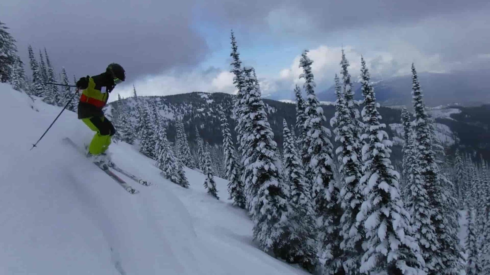 Person skiing down mountain.